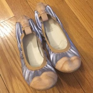 Silver and tan Italy flats